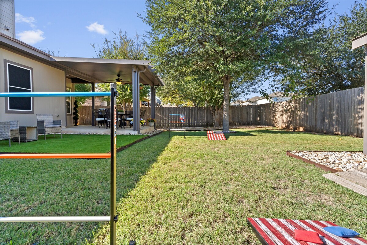 Backyard, Games & Grill yard with cornhole and ladder golf