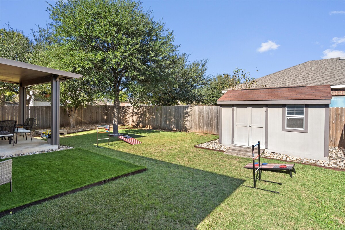 Backyard, Games & Grill fenced lawn, shed, and yard games